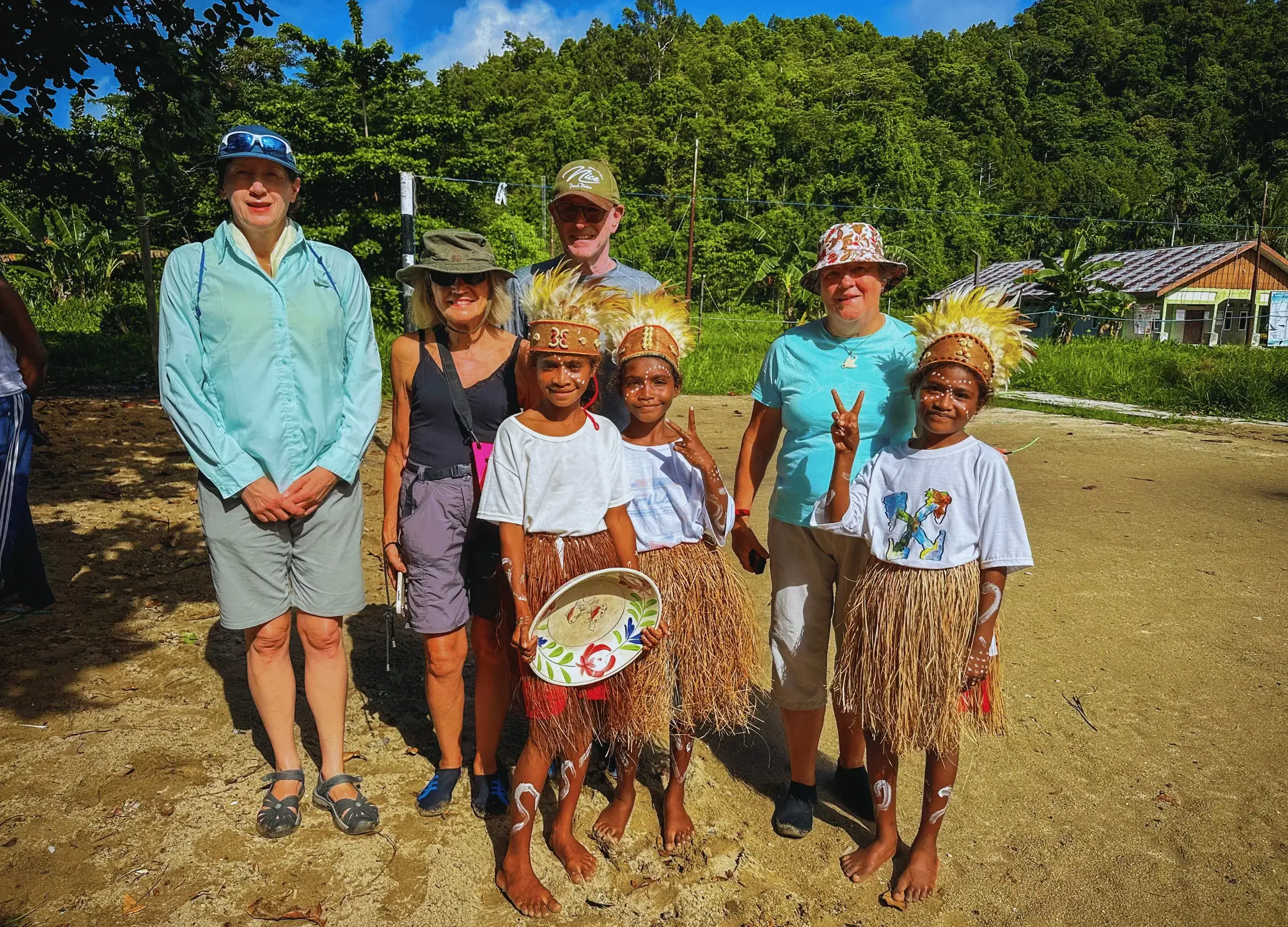 Local kids in Raja Ampat with their beautiful costumes. 