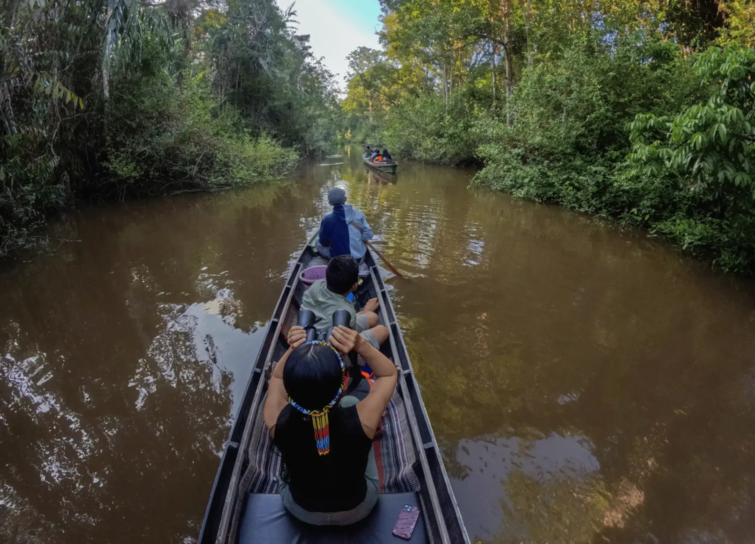 Two Canoes with SeaTrek guest on the River Cruise in Borneo